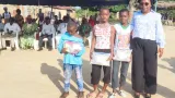 agneby tiassa des kits scolaires remis a des habitants de erimakoudje 2